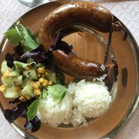 Vegan Portuguese-style sausage was good but I wish the rice had been doctored up a little more. Salad was okay but topped with canned veggies and was pretty small.  at O Oriente no Porto in Porto