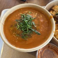 Tomato white bean soup— so good!  at chloe in New York City