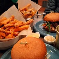 Portobello burguer, bbq burguer, skin-on chips and sweet-potato tempura at O Gambuzino Burger Clube in Lisbon