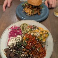 Burrito bowl and Portobello mushroom burger at O Gambuzino Burger Clube in Lisbon