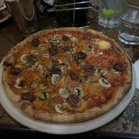 Vegan pizza with vegan cheese, olives, mushrooms, garlic and jalapeños.  at Ciro's Pizza Pomodoro in South West London
