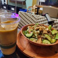 The orange Creamsicle shake and the Caesar salad special. at The Veli  in Pahoa