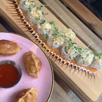 Sweetcorn roll and kimchi dumplings   at Ima in London