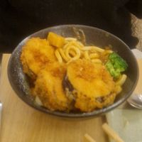 Curry noodles and breaded aubergine at Ima in London