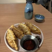 Kimchi gyoza and yuzu sake!  at Ima in London