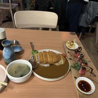 Miso soup, “chicken” katsu curry, black miso “cod” sushi roll  at Ima in London