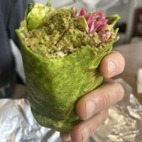 Falafel wrap.  Took some bites and caught up in the delicious flavours before we remembered to take a pic.   at Tastoria Kitchen - Food Stand in Oshawa