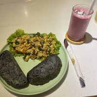 Scrambled tofu and toast with a pink dragon fruit smoothie   at iVegan Supershop Nha Trang - Healthy Plant Based Cafe in Nha Trang