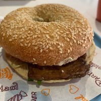 🇵🇸🗝️👩🏽‍🍼🌏🇵🇸Tempeh-filled Bagel Bun with Sprouts, Tomato and Lettuce 🇵🇸⚖️ at iVegan Supershop Nha Trang - Healthy Plant Based Cafe in Nha Trang