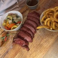 Vegan 300g steak, curly fries, veggies, gravy  at The ASH  in Bochum