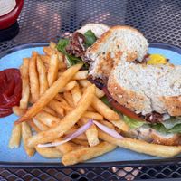 Deluxe Burger with fries  at Ravina Bay Bar & Grill in Lake Delton