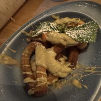 Churros with pistachio butter  at Hans im Glück in Berlin