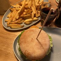 Vegan chi*ken burger with a side of fries (large)  at Hans im Glück in Berlin