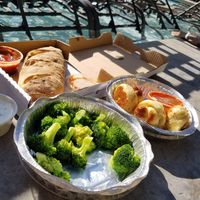 Get it delivered poolside! Vegan roll, vegan garlic knots and perfectly cooked broccoli at Pizza Company in Las Vegas