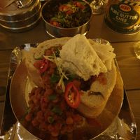 Holy Chow:
Vegan showstopper. A good sharer. Spiced chickpea, potato, spinach, fresh ginger & mango served in a loaf. at Mowgli in Knutsford