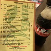 Vegan menu out on the tables at Express Pizza in Copenhagen