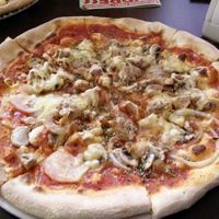 'Chicken', mushroom and onion pizza at Express Pizza in Copenhagen