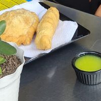 Pallito de queso and empanada at Shottas Medellin Vegan Food in Medellin