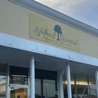 Full house mix. Curried  soy chunks and teriyaki tofu curry, rice, cabbage, beans, etc.   at Lifefoods Universal in Titusville