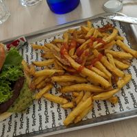 Burger and fries (little ketchup provided) at SayCheese! in Barcelona