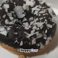 Vegan vanilla donut with chocolate icing and coconut at Check Out My Buns in Belfast