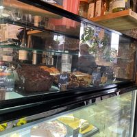 Vegan chocolate banana bread, vegan flapjack, & vegan florentine cookie  at Garden Café Brighton in Brighton