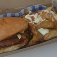 Vegan beef burger with a side of wedges at Cafe La Wheels in Seaford