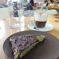 Great vegan and sugar free cake (matcha and banana with a chia base) and chicory cappuccino at Sopa - Boronat in Barcelona
