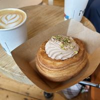 Pastry filled with pistachio cream and chocolate orange cream topping  at Twist Artisan Bakery in Dublin