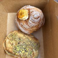 Top is banoffee croissant/muffin and bottom is pistachio pastry  at Twist Artisan Bakery in Dublin
