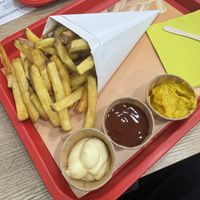 Fries with mayo, curry ketchup, and burger sauce  at Fries and More  in Brussels