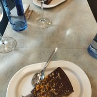 Postre de tarta de algarrobo con naranja at Vegano A Seimeira in Lugo