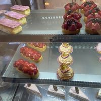 Friday 27 June 2025: the passion fruit tartelette (tasty cream, but bland bottom) and apple pie with raspberry cream (decent) are new. at Lente - Vegan Patisserie in Gouda