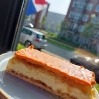 (orange) tompouce, during Kingsday in NL at Lente - Vegan Patisserie in Gouda