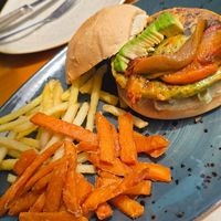 Vegan burger with fries at L'Estret in Palafrugell