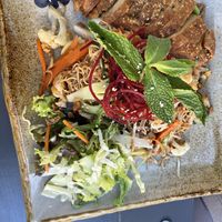 Seitan duck with fried noodles  at Bödhi in Leipzig