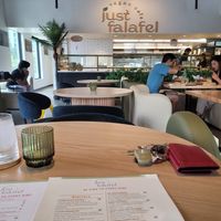 Cute, clean restaurant with great attention to detail in all aspects. at Just Falafel Vegan Cafe in Houston