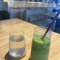 Mint lemonade.  Perfect balance—not to sweet, not too tart.  And check out the lovely glassware.    at Just Falafel Vegan Cafe in Houston