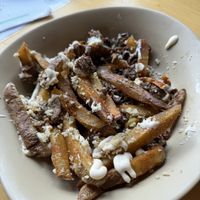 Loaded Gyro Truffle Fries  at Just Falafel Vegan Cafe in Houston