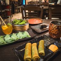 Edamame, Gemüse-Dumplings, Vegane Frühlingsrollen, Hausgemachter Eistee. at Wengo Dumplings in Cologne