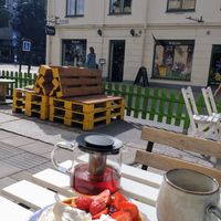 Belgian waffle with berries, cream and ice cream. at Queen Beans in Uppsala
