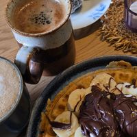 Tasty and very filling waffle, good coffee and nice variety of sweets at Queen Beans in Uppsala