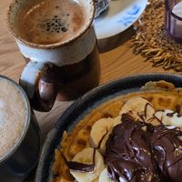 Tasty and very filling waffle, good coffee and nice variety of sweets at Queen Beans in Uppsala