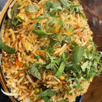 Veggie biryani (made vegan)   at Bibi's Tiffin 2 in Breinigsville