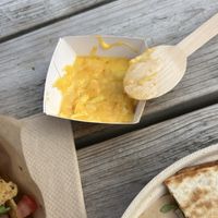 forgotten cheddar from nachos  at terra food truck in Zeebrugge