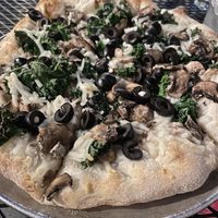 Umami pizza made vegan sub onions for olives no balsamic   at Lucille in Madison