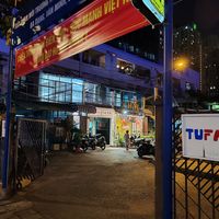 In the courtyard on the left side at Cỏ Ba Lá Vegetarian in Ho Chi Minh City