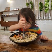 Kids enjoy making their own bowl at Vege Creek 蔬河 - Yanji St in Taipei