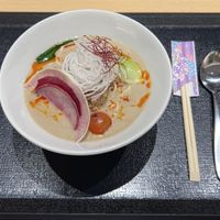 Dandan noodles. Slightly spicey creamy sauce, fresh veg garnishhed with  at HND - Diversity Diner - T3 - Departures in Tokyo