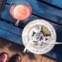 Whoops, almost too late. A little bit of the raw avocado coconut cake and my watermelon smoothie. Both were delicious! at Rawsome in Arnhem